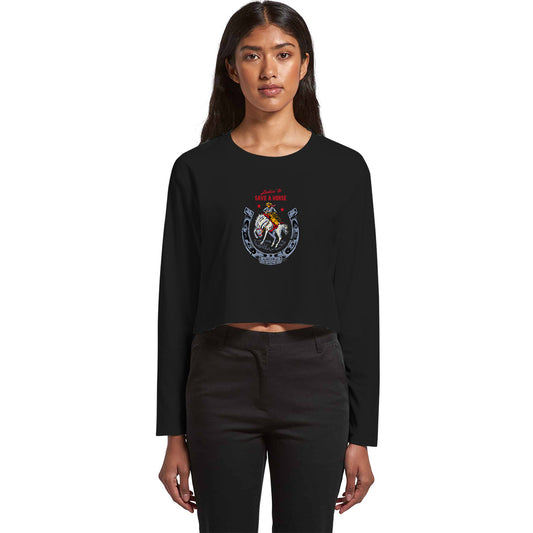 Ladies long sleeved crop t-shirt in black cotton. Front graphic features a vintage-style illustrtion of a cowboy riding a bucking bronco. Text says Lookin' to save a Horse.