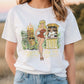 White cotton tee shirt with an original illustration featuring a sexy tiki queen pionup lady. Behind her a tiki statue bursts into flames and a sailor behind a little tiki bar spills his drink because he can't take his eyes off her.