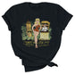 Black cotton tee shirt with an original illustration featuring a sexy tiki queen pionup lady. Behind her a tiki statue bursts into flames and a sailor behind a little tiki bar spills his drink because he can't take his eyes off her.