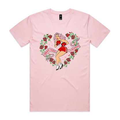 Pink unisex t-shirt features a print of a vintage pinup lady wearing boxing gloves surrounded by red roses. A banner says Beat you to the punch"
