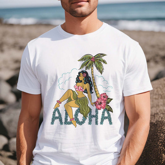 Mens white tee shirt with vintage style graphic on the front featuring a hula girl sitting under a plam tree. She is sitting on some lettering made of flowers that says "ALOHA"