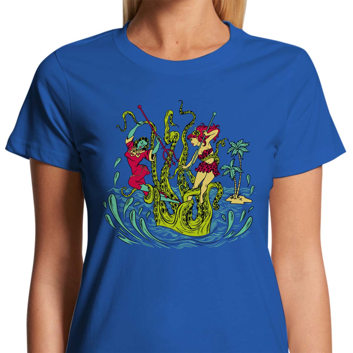 Ladies bright royal blue t-shirt with a vintage tiki style graphic by 50s Vintage Dame showing two pinup women fighting a giant sea creature.