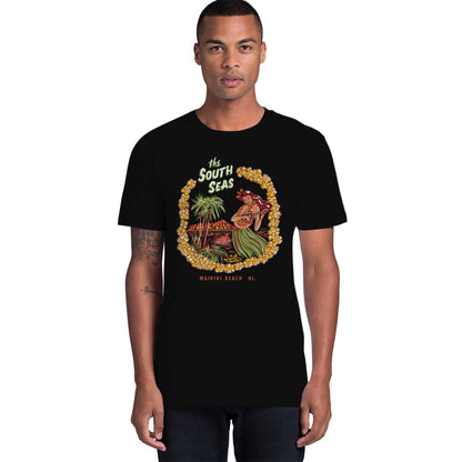Vintage matchbook style unisex mens t-shirt with a hula girl playing a ukelele on Waikiki beach with palm trees and Diamond head in the background. Text says "The South Seas"