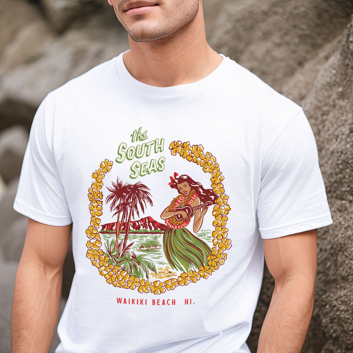 Vintage matchbook style unisex mens t-shirt with a hula girl playing a ukelele on Waikiki beach with palm trees and Diamond head in the background. Text says "The South Seas" WHite tee shirt