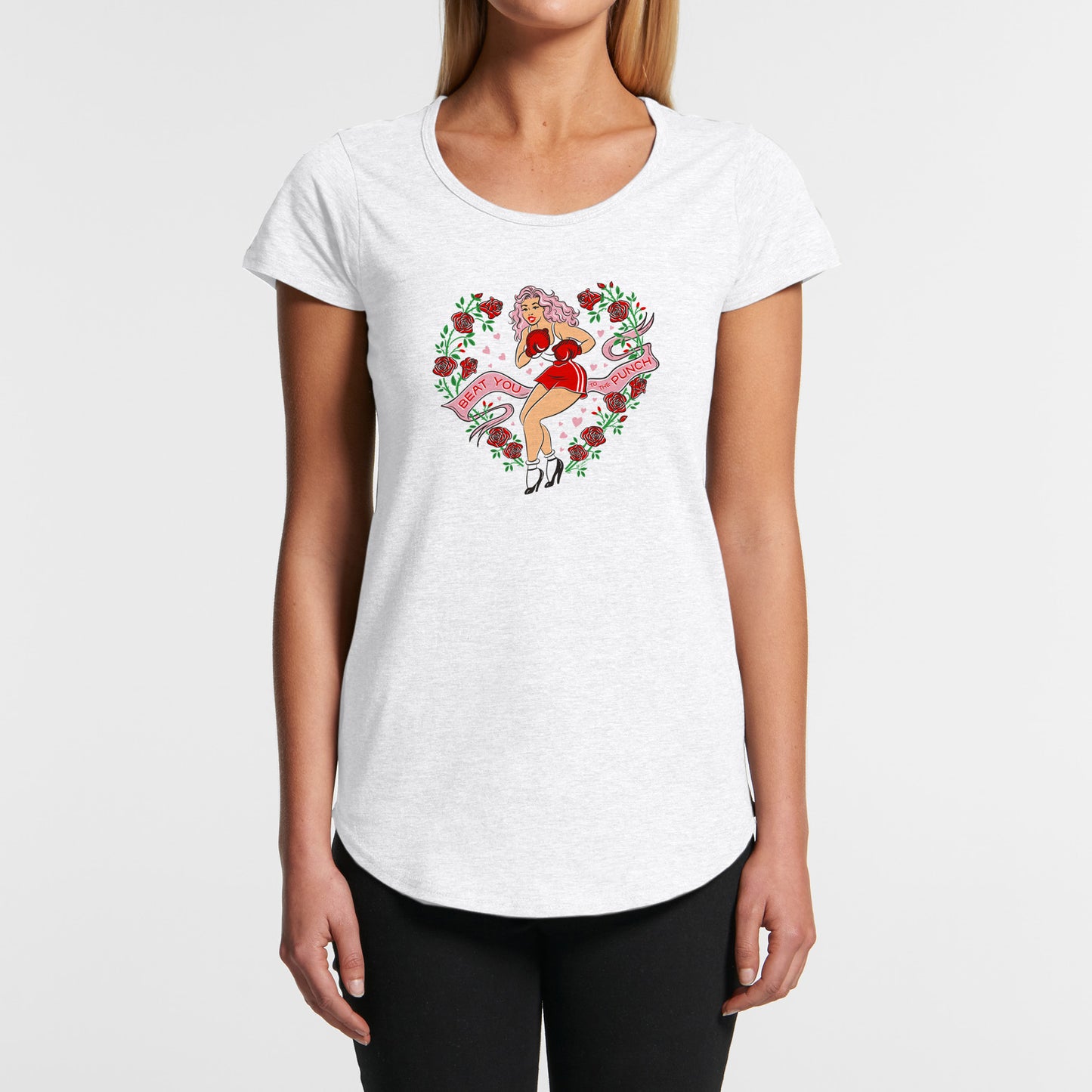 White t-shirt with a graphic design of a woman  with red boxing gloves and flowers on a white background