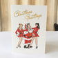 Retro midcentury rockabilly Christmas card with Santa and two pinup girls