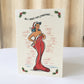 Retro rockabilly Christmas card of a pinup girl illustration in a giant Christmas stocking