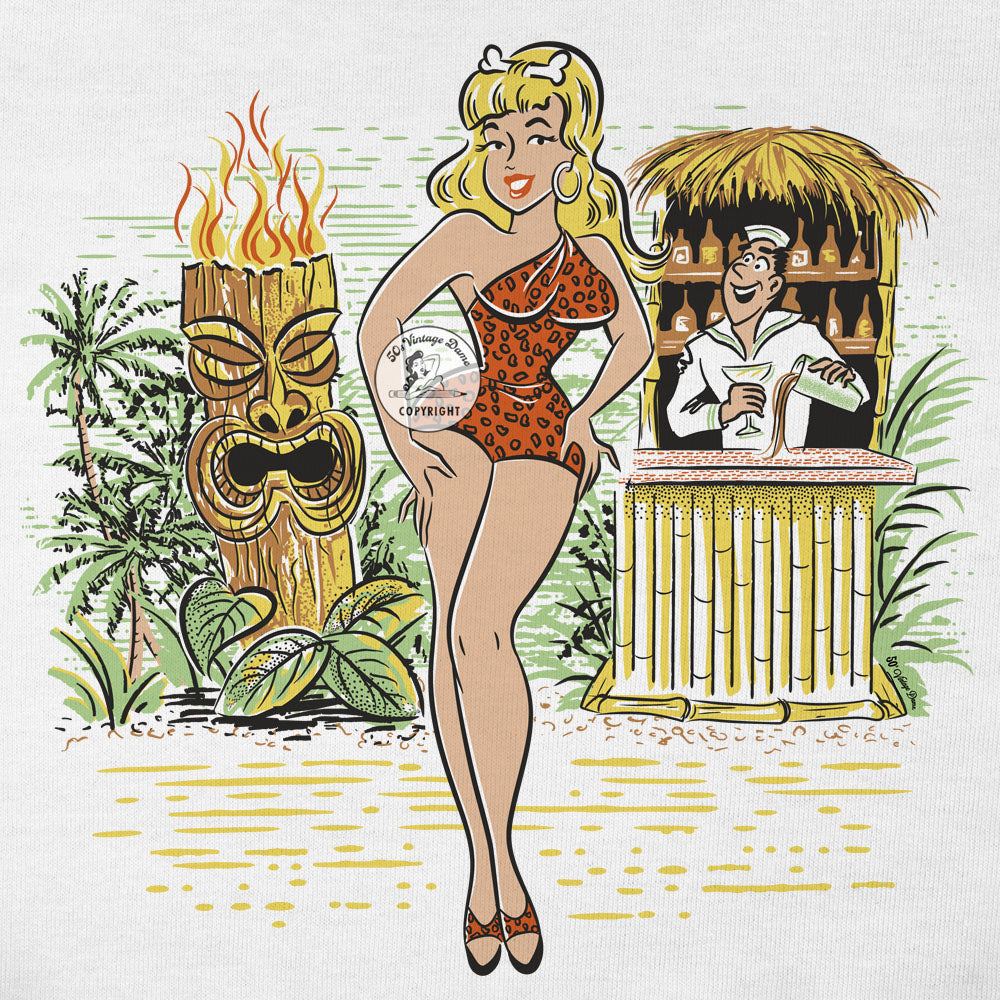 White cropped tee shirt with an original illustration featuring a sexy tiki queen pionup lady. Behind her a tiki statue bursts into flames and a sailor behind a little tiki bar spills his drink because he can't take his eyes off her. Closeup pic.