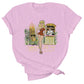 Pink cotton tee shirt with an original illustration featuring a sexy tiki queen pionup lady. Behind her a tiki statue bursts into flames and a sailor behind a little tiki bar spills his drink because he can't take his eyes off her.